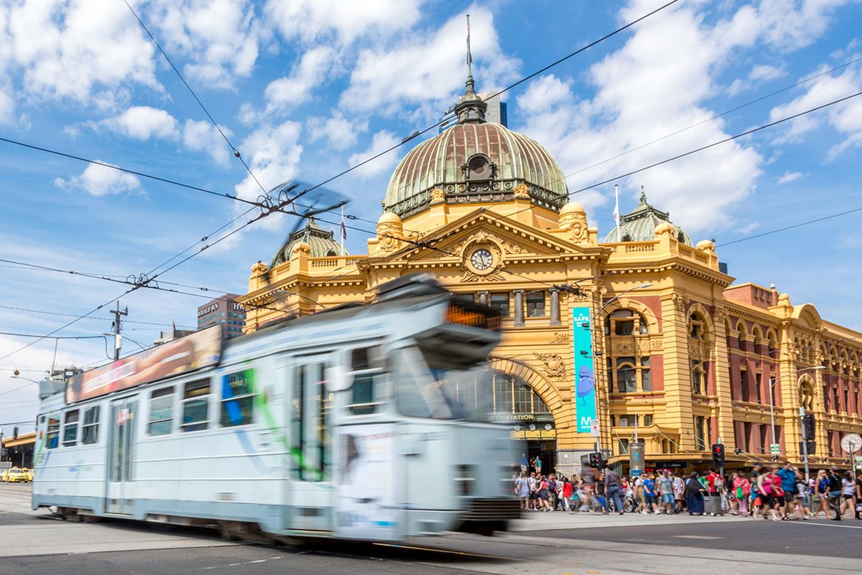 Tram going past Flinders Street Station, Melbourne