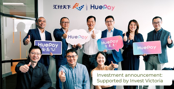 HuePay staff and Chairman and CEO Jerry Zhou, as well-as Invest Victoria's Zhining Yang at the opening ceremony for the launch of the HuePay Australian subsidiary in Melbourne