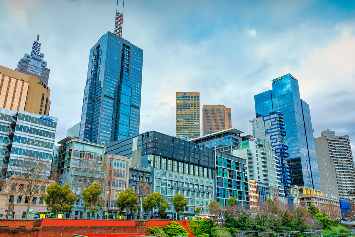 View of buildings in Melbourne CBD from Flinders Street.